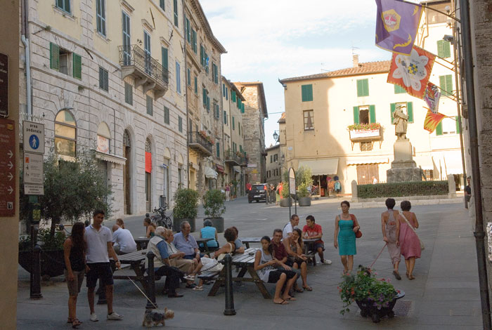 Italian village with people walking